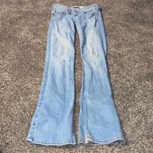 Size: W24 L33. Brand: Hollister. Color: Blue jeans.